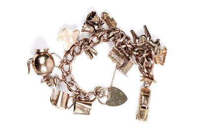 Lot 109 - A 9ct gold curb-link charm bracelet