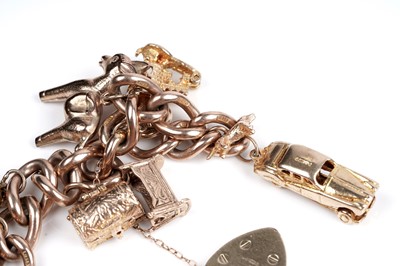 Lot 109 - A 9ct gold curb-link charm bracelet