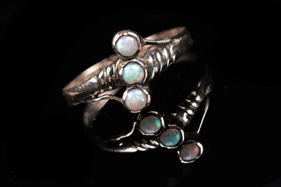 Lot 145 - A Victorian three-stone opal ring