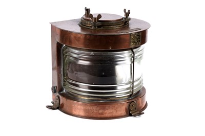 Lot 123 - A copper and glass masthead ships lamp
