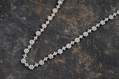 Lot 540 - A diamond line necklace