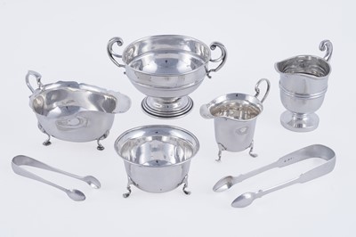 Lot 366 - A George V silver helmet shaped cream jug; and other silver teaware