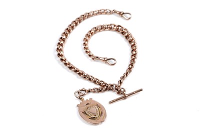 Lot 45 - An early 20th Century 9ct rose gold double "Albert" watch chain; and a fob medallion