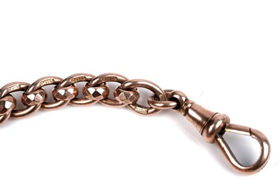 Lot 45 - An early 20th Century 9ct rose gold double "Albert" watch chain; and a fob medallion