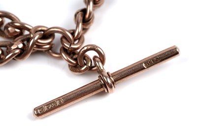Lot 45 - An early 20th Century 9ct rose gold double "Albert" watch chain; and a fob medallion