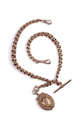 Lot 45 - An early 20th Century 9ct rose gold double "Albert" watch chain; and a fob medallion