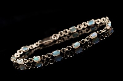Lot 58 - A 9ct gold and opal bracelet