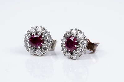 Lot 31 - A pair of ruby and diamond stud earrings; and a ruby and diamond ring