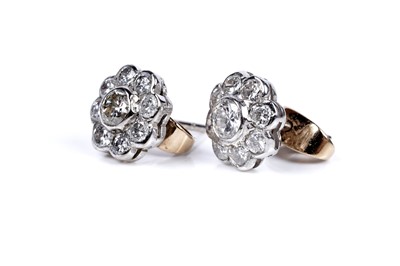 Lot 3 - A pair of diamond flowerhead pattern stud earrings