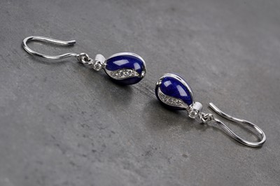 Lot 560 - Fabergé: a pair of egg pattern enamel and diamond earrings