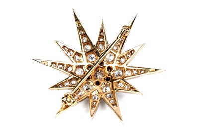 Lot 562 - Cropp & Farr: a Victorian style star pattern diamond brooch