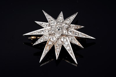 Lot 562 - Cropp & Farr: a Victorian style star pattern diamond brooch