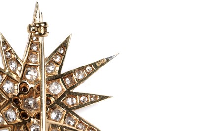 Lot 562 - Cropp & Farr: a Victorian style star pattern diamond brooch