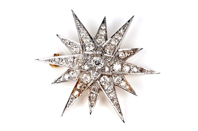 Lot 562 - Cropp & Farr: a Victorian style star pattern diamond brooch