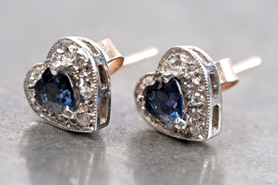 Lot 147 - A pair of sapphire and diamond love heart earrings