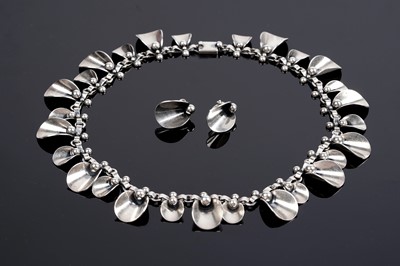 Lot 162 - A Niels Erik From of Denmark: a Modernist silver calla lily necklace and earring set