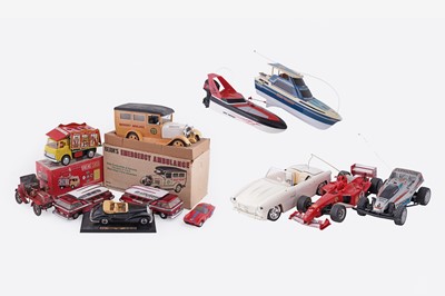 Lot 903 - A selection of model cars; and two remote control boats
