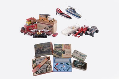 Lot 391 - A selection of model cars; and other toys