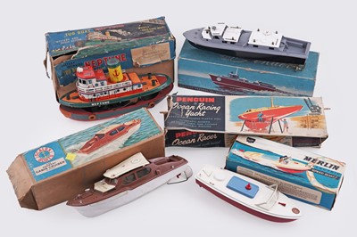 Lot 904 - A collection of five boxed model boats