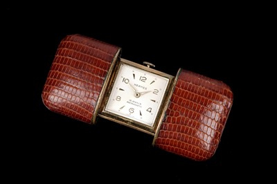Lot 458 - Hermes: a gilt metal and leather covered purse watch