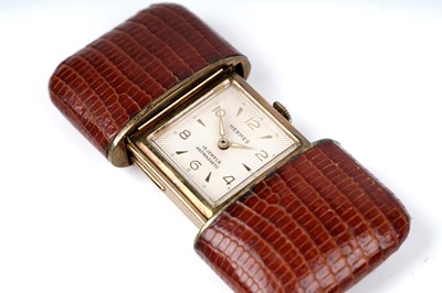 Lot 458 - Hermes: a gilt metal and leather covered purse watch