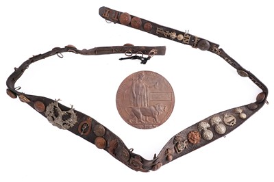 Lot 22 - A WWI plaque; and cap badge mounted belt