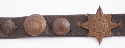 Lot 22 - A WWI plaque; and cap badge mounted belt