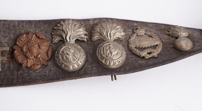 Lot 22 - A WWI plaque; and cap badge mounted belt