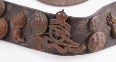 Lot 22 - A WWI plaque; and cap badge mounted belt