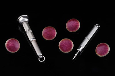 Lot 235 - Two Elizabeth II silver cigar piercers; and a set of five silver gilt and pink enamelled buttons