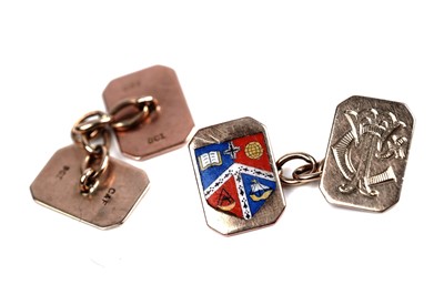 Lot 27 - A pair of 9ct gold champleve enamelled cufflinks depicting an armorial shield