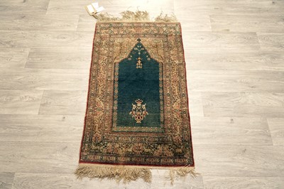 Lot 95 - A Turkish silk prayer rug