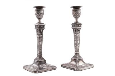Lot 97 - A pair of late Victorian silver candlesticks