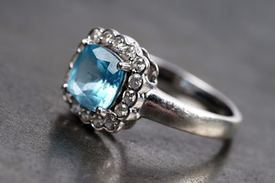 Lot 86 - A "Swiss blue" topaz and diamond ring