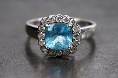 Lot 86 - A "Swiss blue" topaz and diamond ring