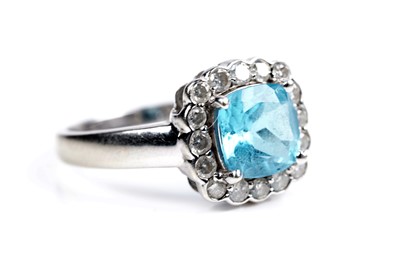 Lot 86 - A "Swiss blue" topaz and diamond ring