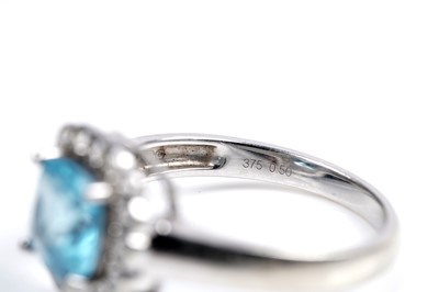 Lot 86 - A "Swiss blue" topaz and diamond ring