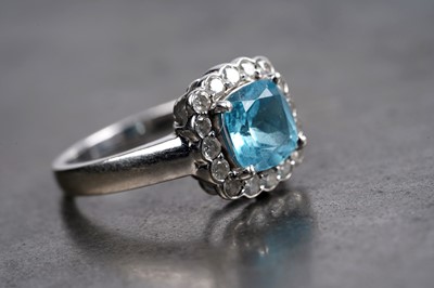 Lot 86 - A "Swiss blue" topaz and diamond ring
