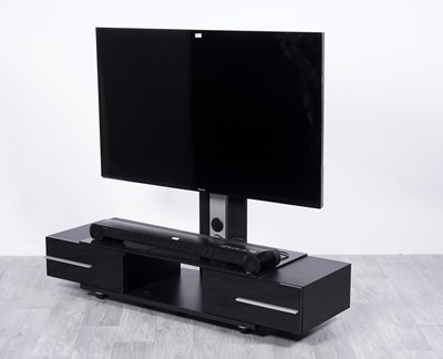 Lot 46 - A gloss black contemporary TV unit; a TV; and hi-fi accessories