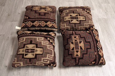 Lot 101 - Four cushions upholstered in a Kilim-type fabric