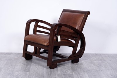 Lot 89 - An Art Deco style stained hardwood armchair