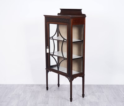 Lot 67 - An Edwardian carved mahogany display cabinet