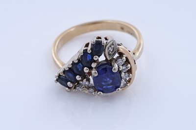 Lot 83 - A modern sapphire and diamond cocktail ring