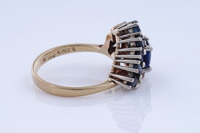 Lot 83 - A modern sapphire and diamond cocktail ring