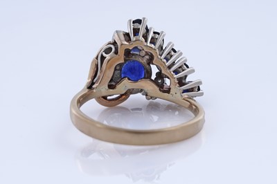 Lot 83 - A modern sapphire and diamond cocktail ring