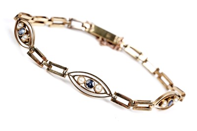 Lot 134 - An Edwardian sapphire and pearl bracelet