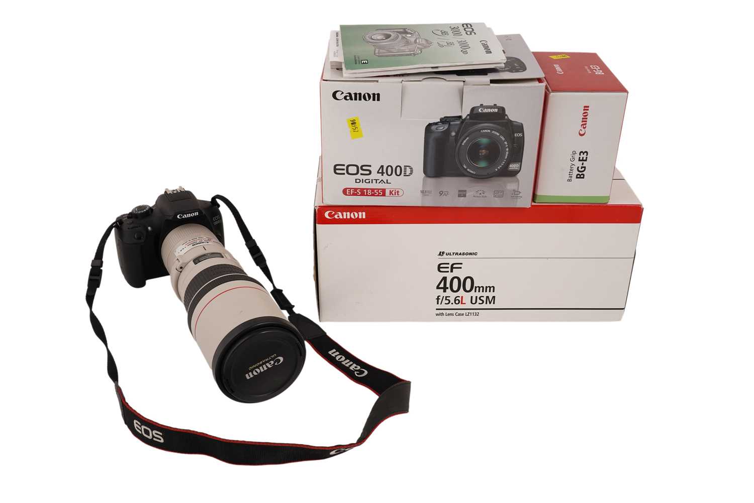 Lot 134 - A Canon EOS 1300D digital camera and accessories