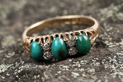Lot 138 - An Edwardian three-stone turquoise and diamond ring