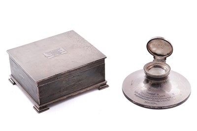 Lot 378 - A substantial George V engine turned cigarette box; and a George V silver capstan form inkwell