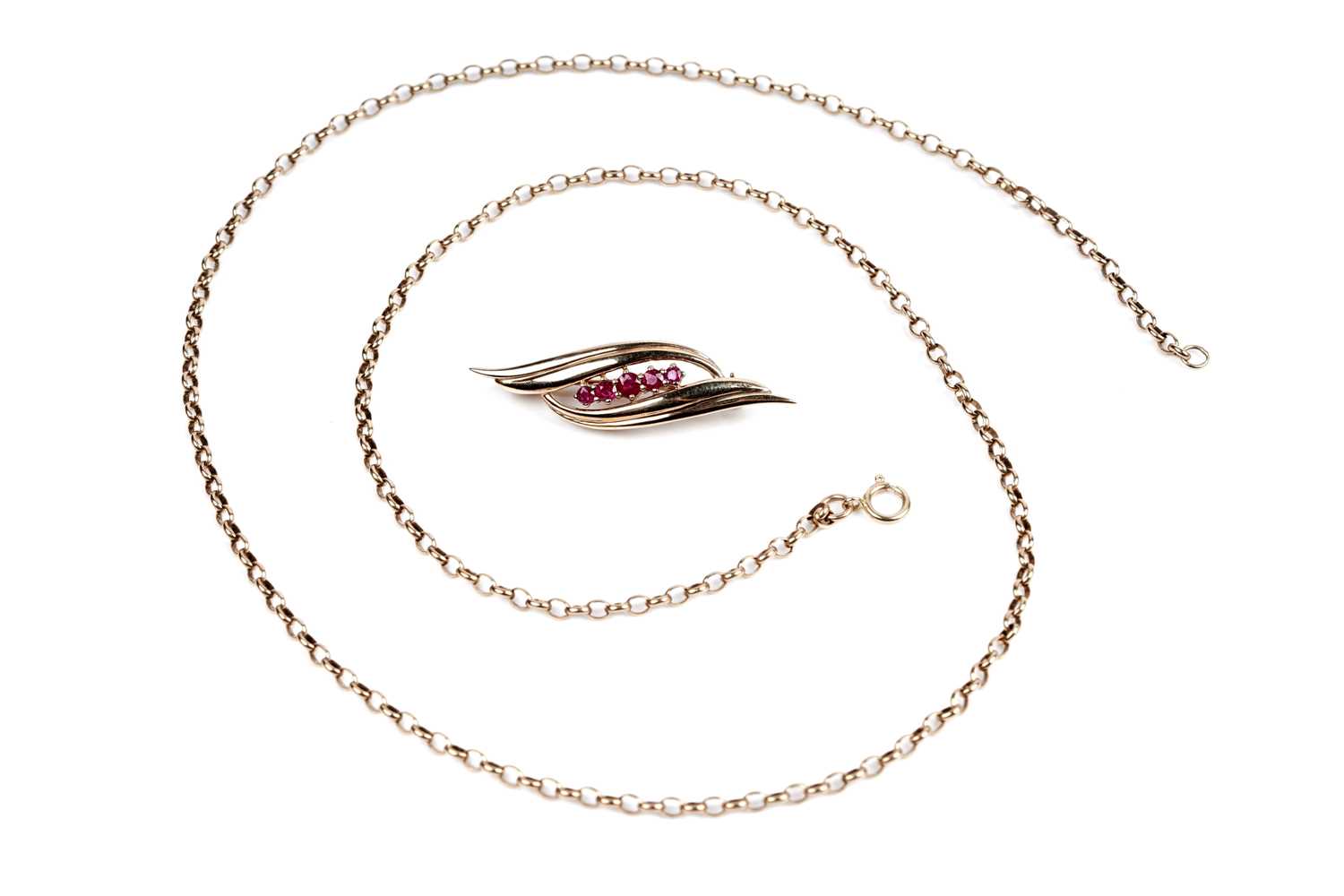 Lot 190 - A modern ruby and 9ct gold bar brooch